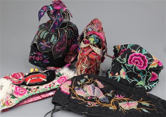 A group of Ethnic Chinese embroidered silk hats